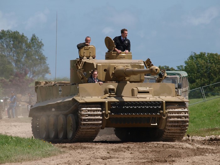 Tiger tank with three men inside