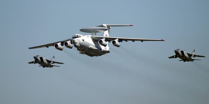 Beriev A-50 and two MiG-31 fighter jets in flight