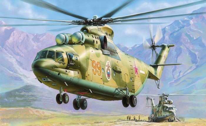Two Russian Mi-26 helicopters in a mountainous landscape