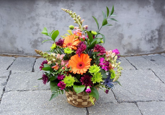 Colorful flower arrangement in a basket