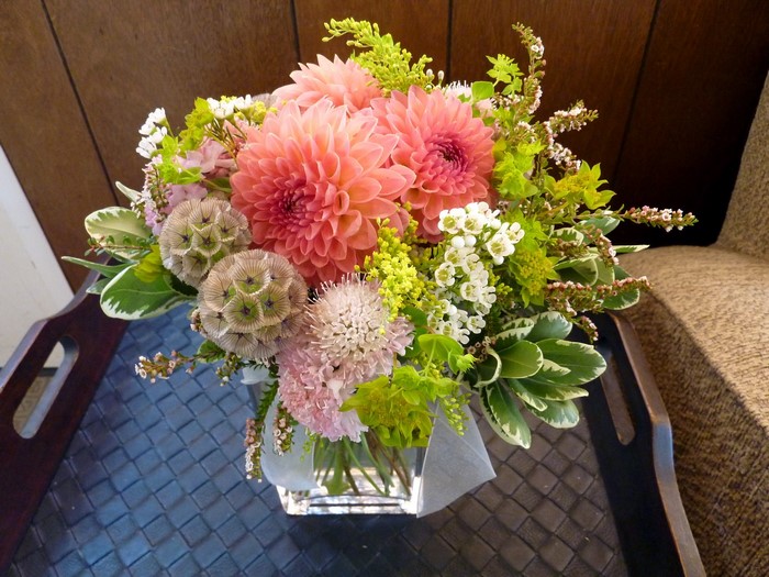 Floral arrangement with dahlias and greenery