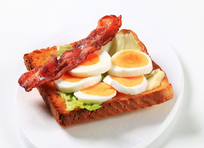 Toast with bacon and hard-boiled eggs