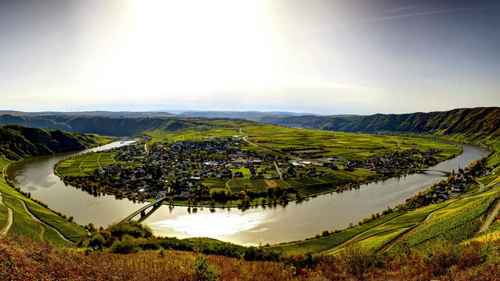 Moselle River loop with vineyards and village, Germany