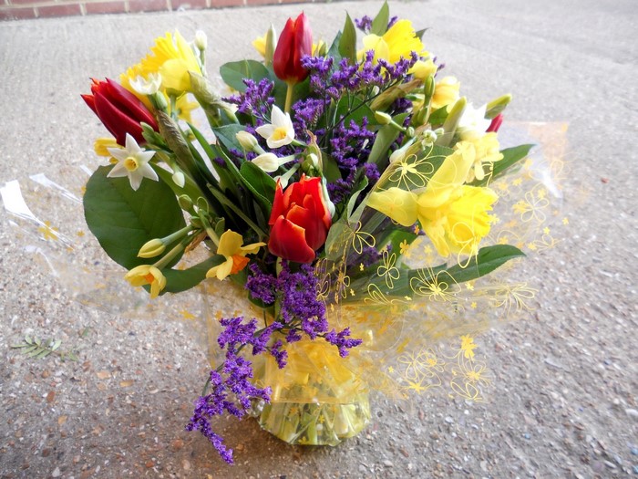 Spring flower bouquet with tulips and daffodils