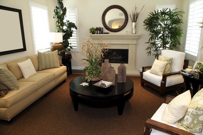Living room with sofa, armchairs, and coffee table