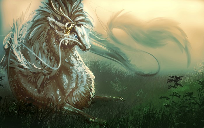 Dragon with ornate headpiece in a misty field