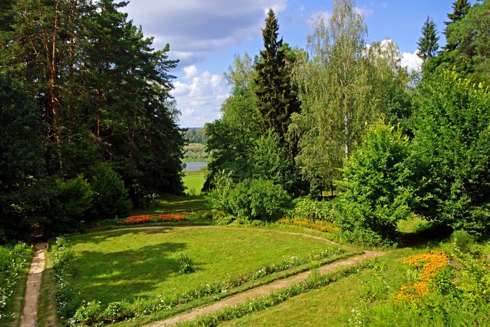 Park with trees, flowers, and a path