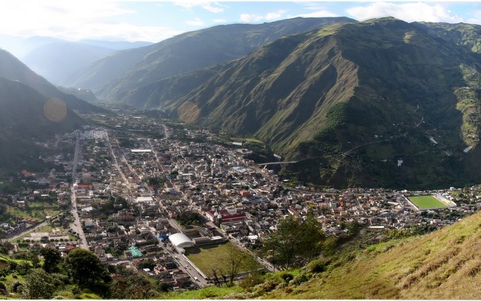 Aerial view of a town nestled in a mountain valley