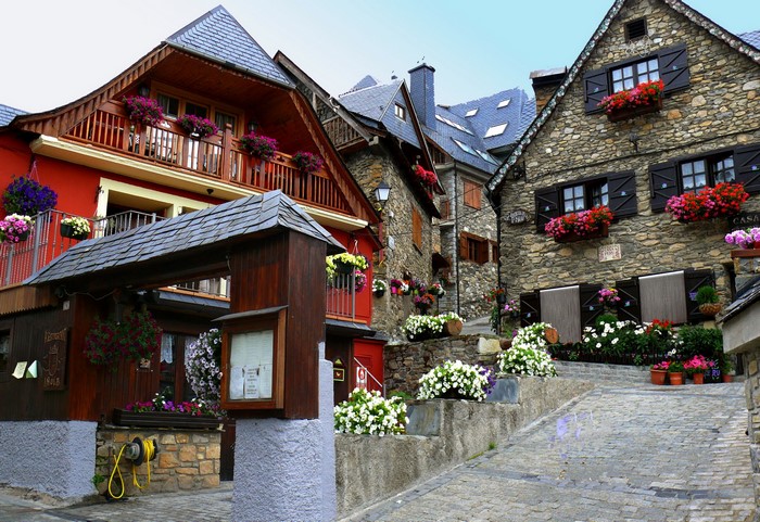 Stone houses with flowers in a Spanish village