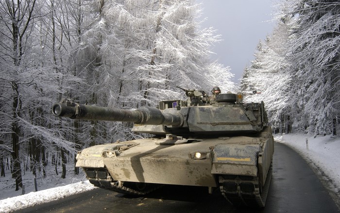 M1 Abrams tank in a snowy forest