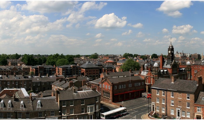 Panoramic view of rooftops and a clock tower in the UK