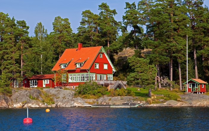 Red houses by the water in Sweden