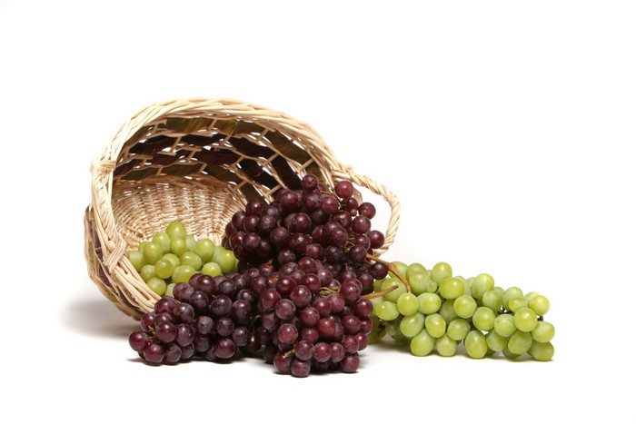 Grapes spilling from a basket