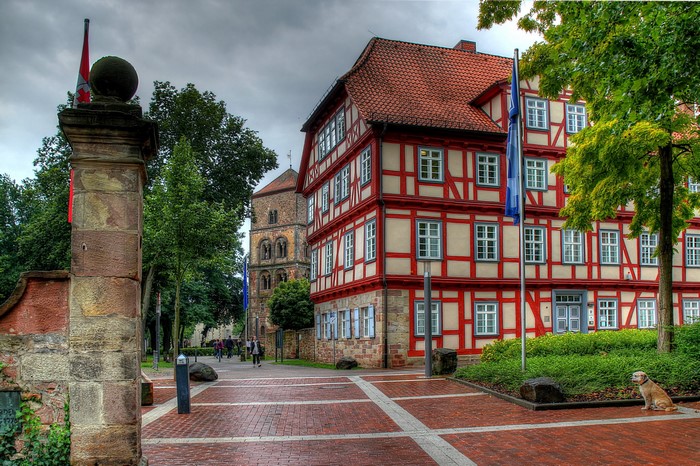 Half-timbered building and church tower in Germany