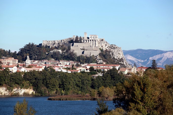 Sisteron, France with citadel and lake