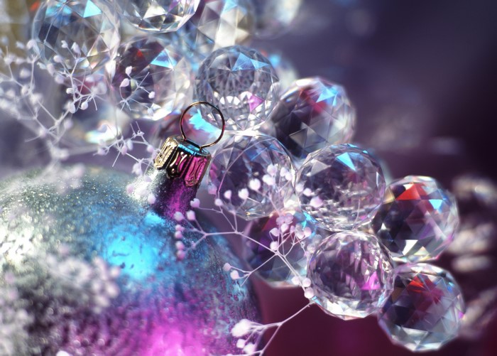 Christmas ornaments with clear faceted balls and white sprigs