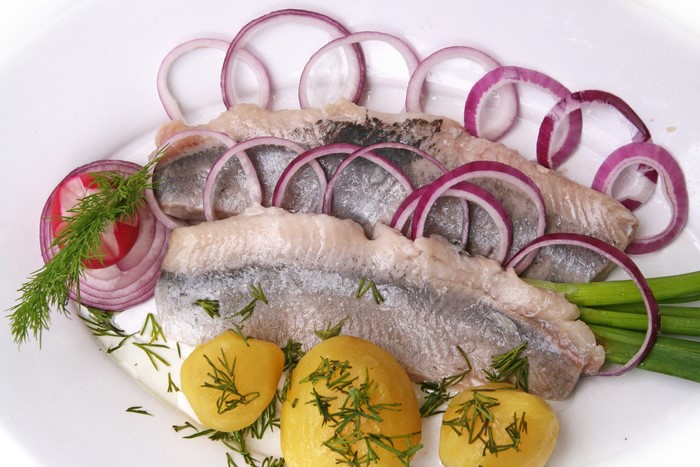 Cooked Fish with Potatoes and Red Onion Rings