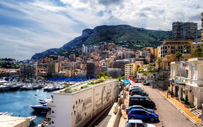 Monaco cityscape with harbor and mountains