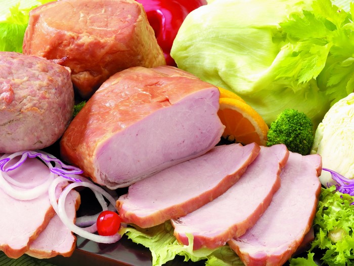 Assortment of cured meats and vegetables
