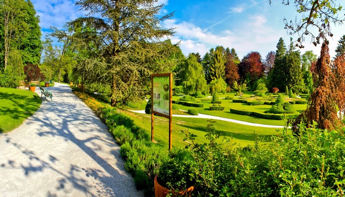Formal garden with manicured hedges and trees