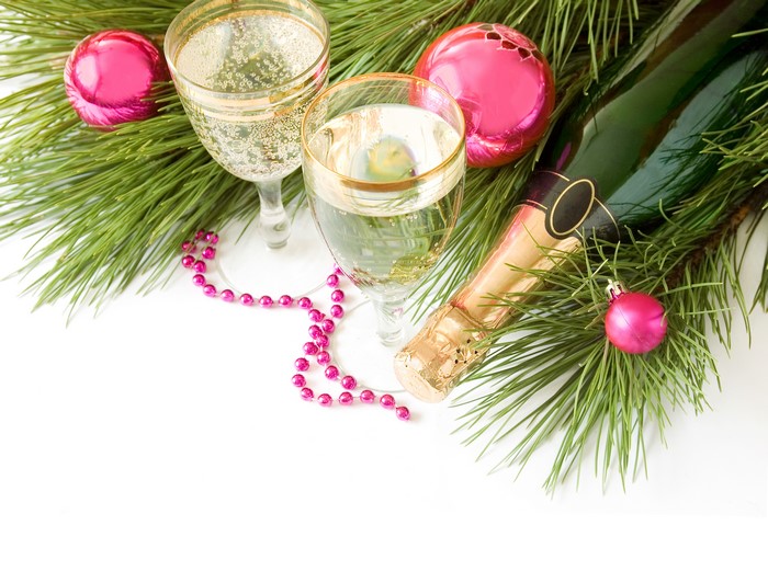 Champagne glasses and bottle with Christmas decorations