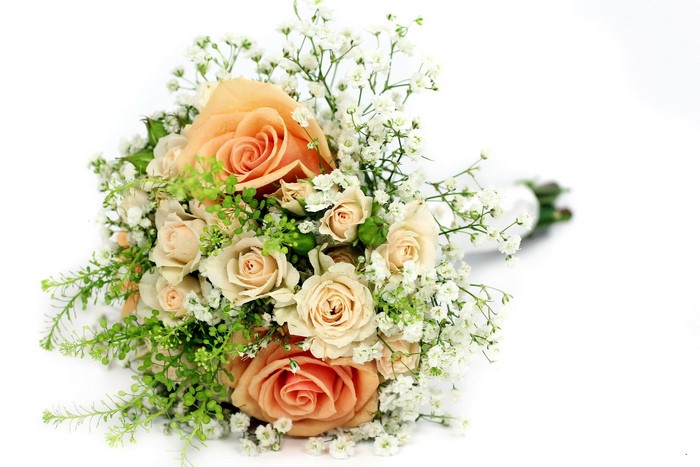Peach and cream rose bouquet with baby's breath