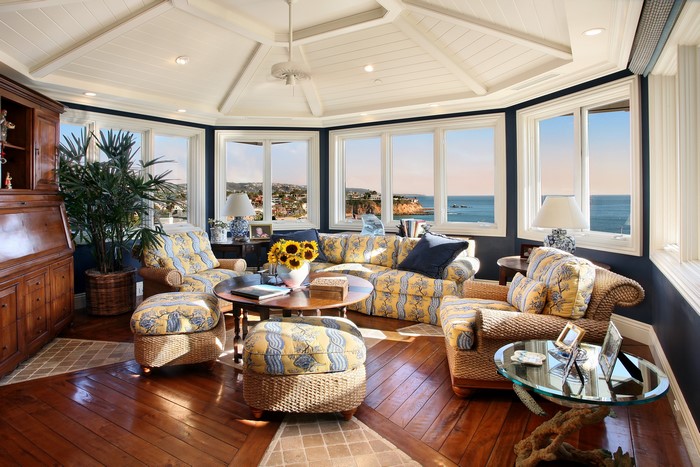 Living room with ocean view and patterned furniture