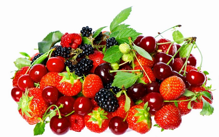 A pile of fresh berries and cherries
