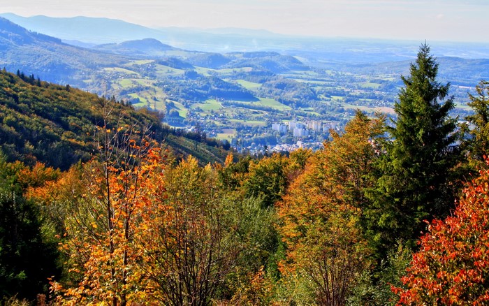 Autumn landscape with a town in the valley, Poland
