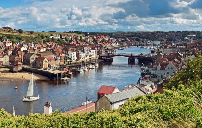 Whitby, United Kingdom harbor with boats and buildings