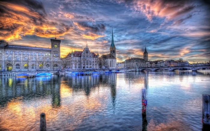 Zurich cityscape with river and dramatic sky