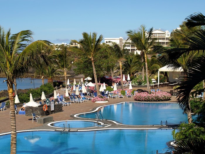 Resort pools and palm trees in the Canary Islands, Spain