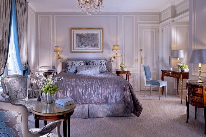 Elegant bedroom with ornate furniture and a large bed
