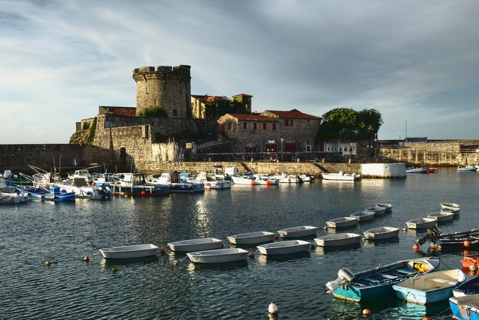Fortress and harbor with boats in France