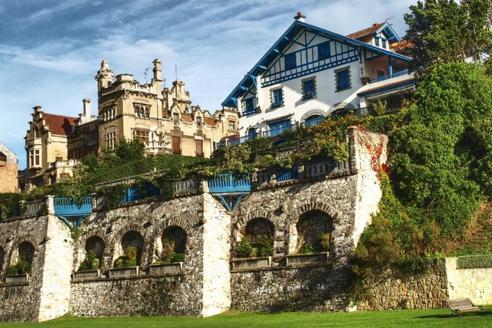Two buildings on a hillside in Spain