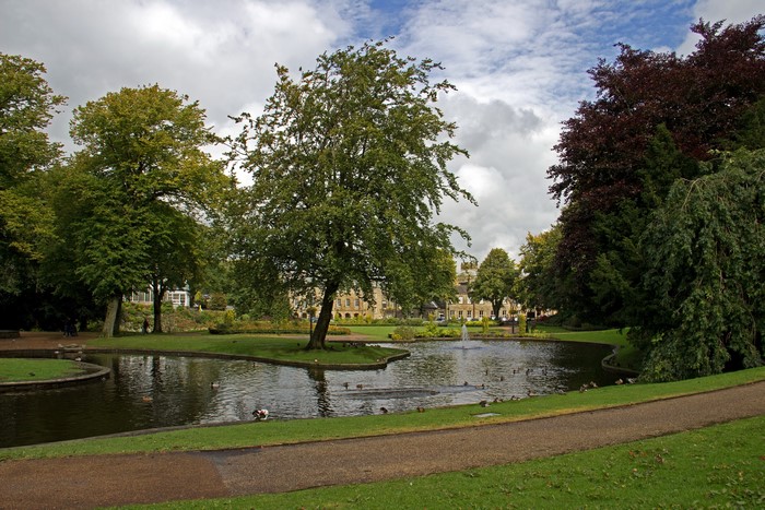 Park with pond and fountain in England