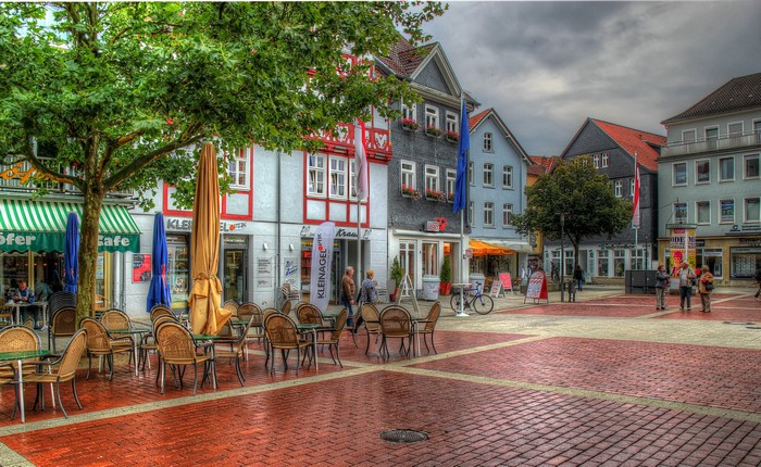 Outdoor cafe seating in a European town square