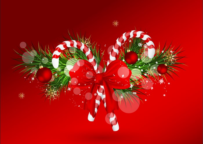Christmas candy canes with pine branches and ornaments
