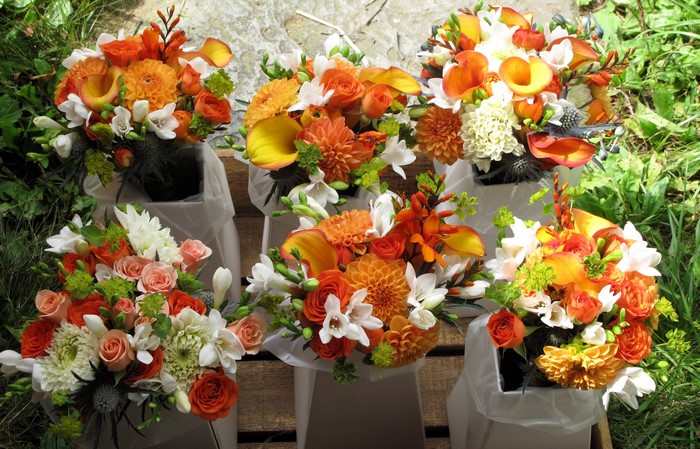 Orange and white floral bouquets