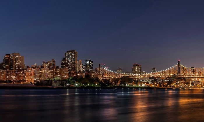 New York City skyline and Queensboro Bridge at night