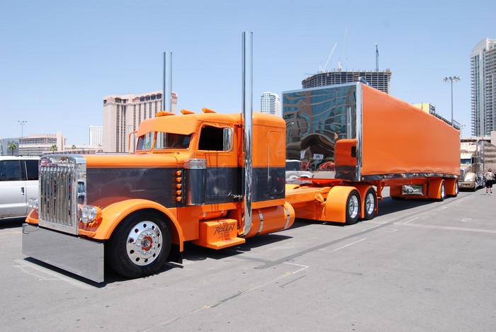 Orange Peterbilt 379 Semi-Truck with Trailer