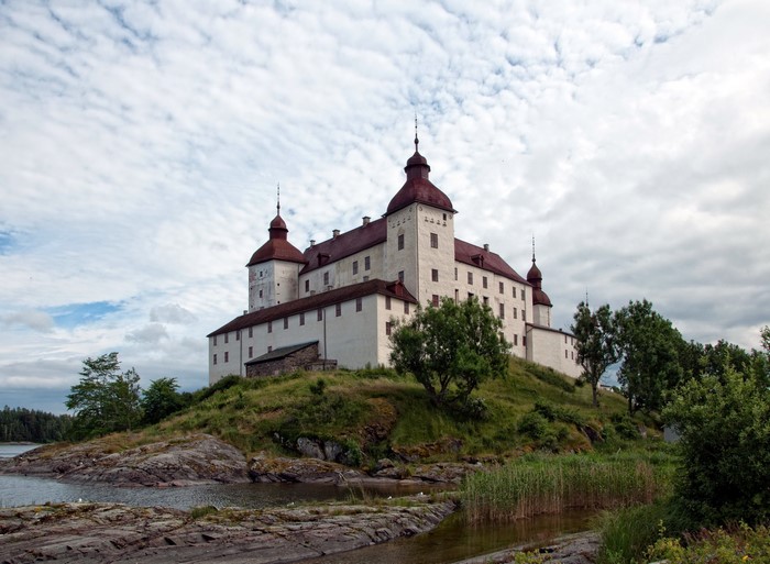 Läckö Castle in Sweden under a cloudy sky