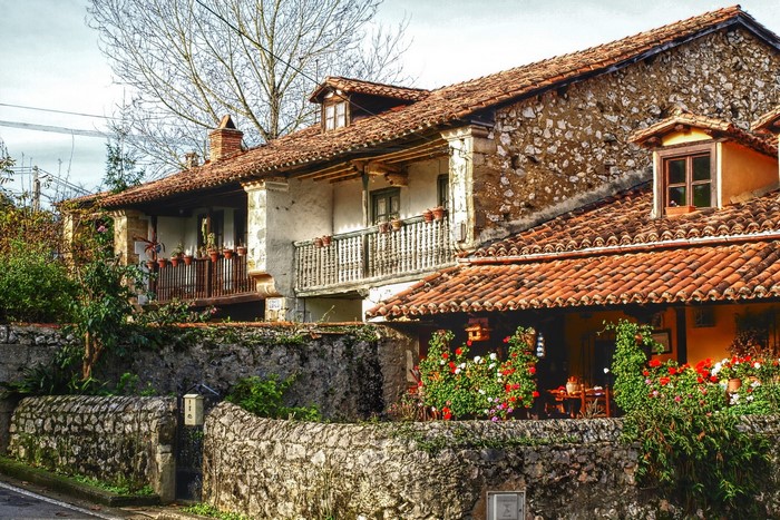 Traditional stone houses with tiled roofs in Spain