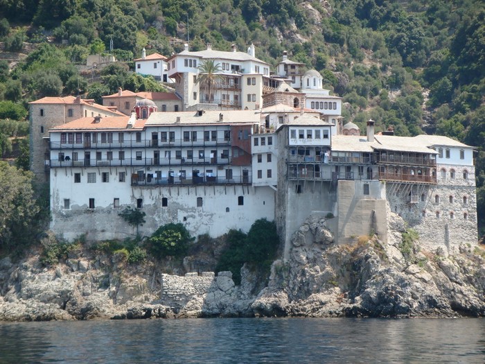 Monastery on a cliff overlooking the sea in Ano Symi, Greece