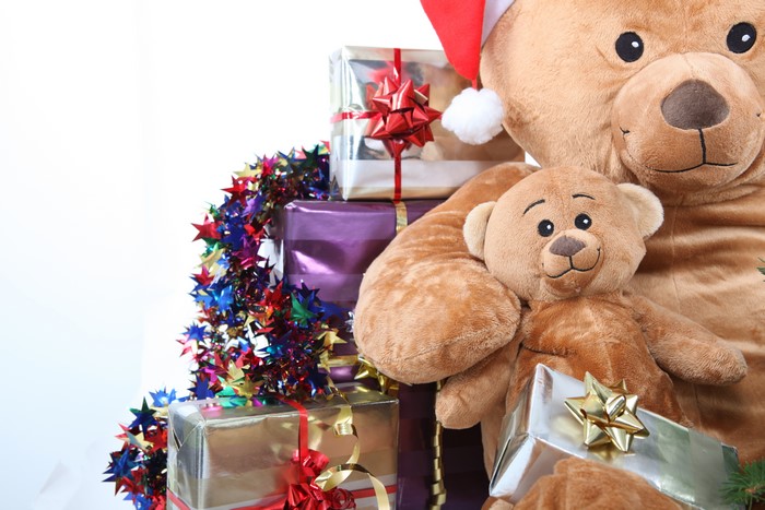Teddy bears and Christmas gifts with tinsel