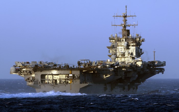Aircraft carrier sailing on the ocean