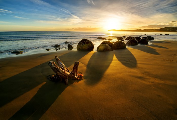 Moeraki Boulders at sunrise on Koekohe Beach, New Zealand