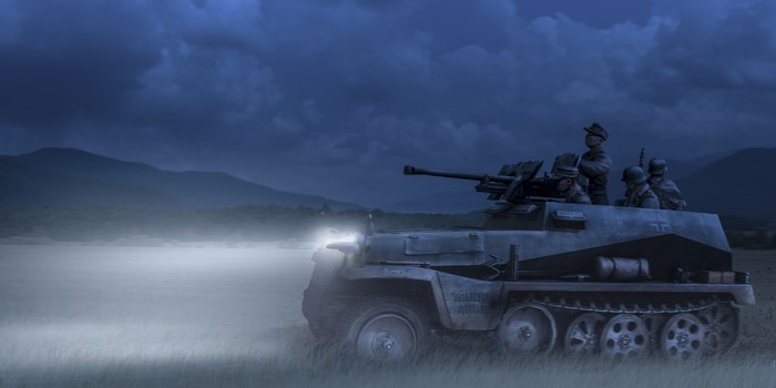 German halftrack with soldiers at night