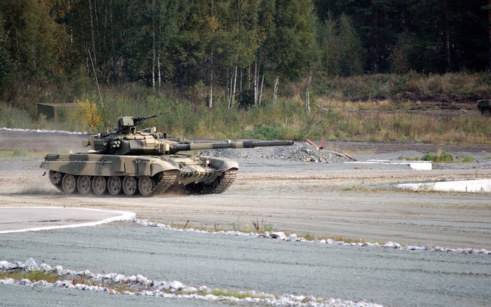 T-90 tank on a dirt track