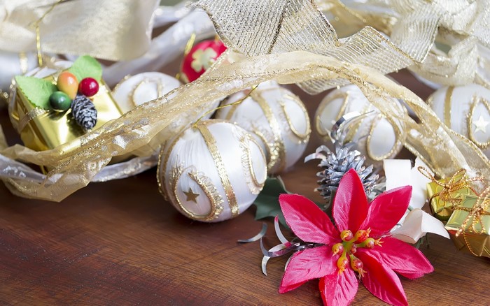 Christmas ornaments and decorations on a wooden table